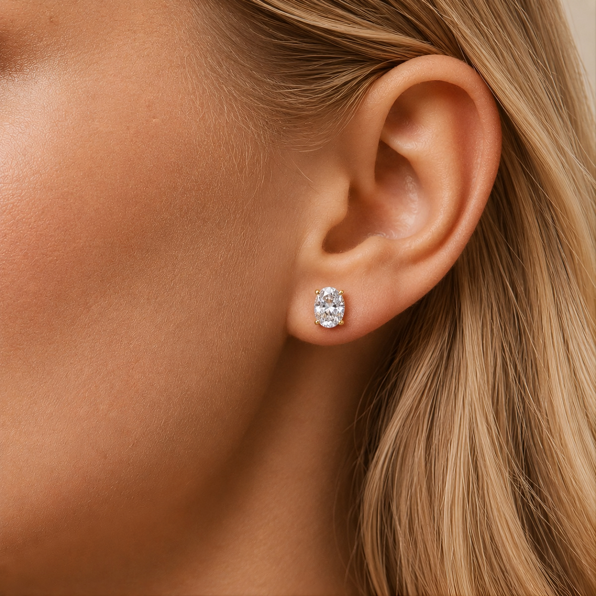 Model wearing Balmante oval cut stud earrings