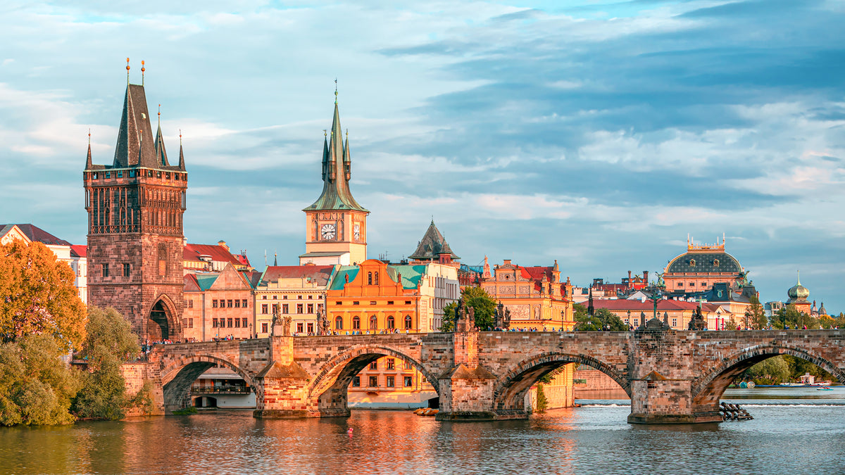 Charles Bridge and the Old Town towers of Prague at golden hour