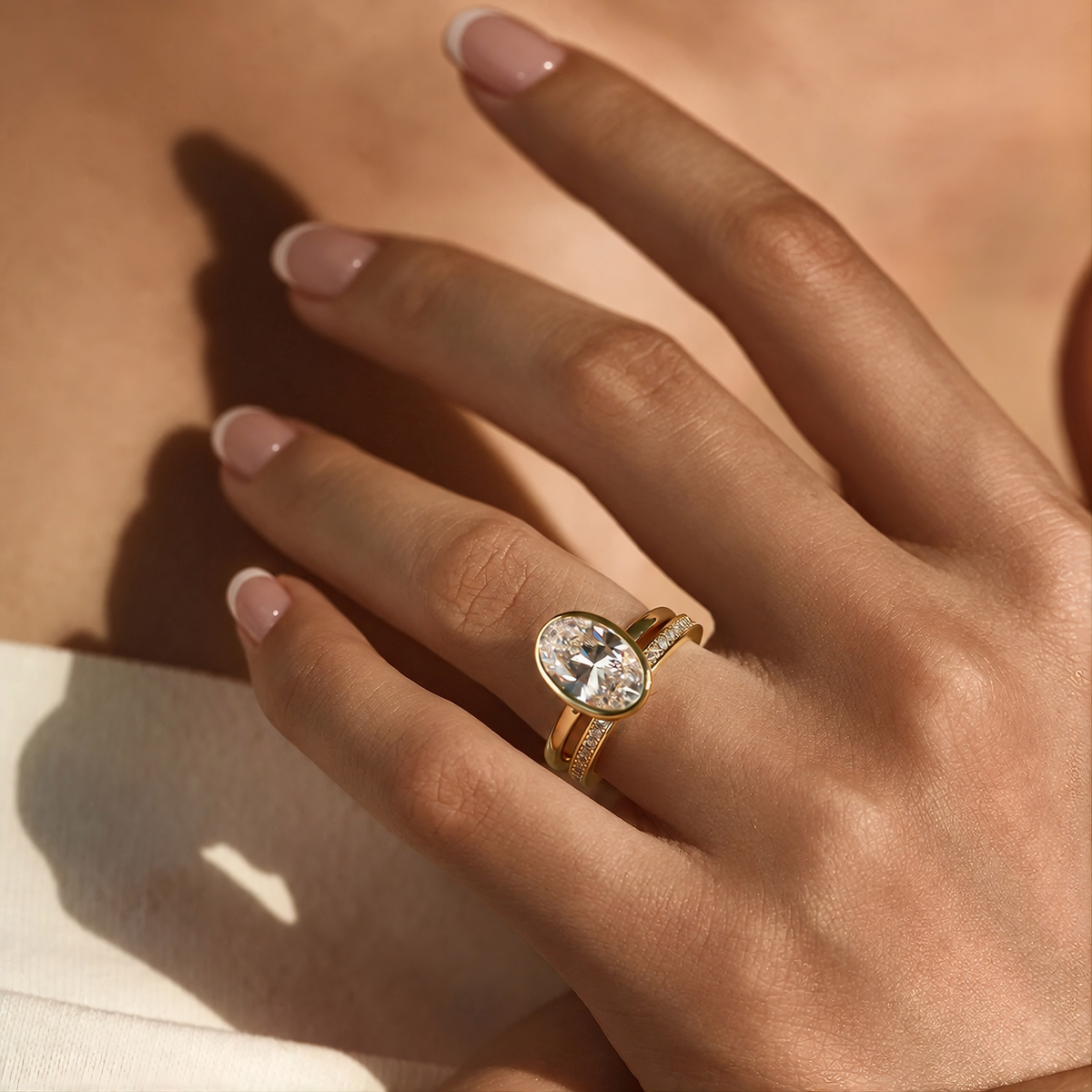 BEZEL OVAL CUT RING